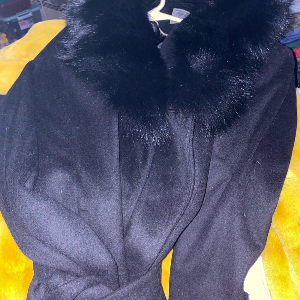 Woman’s coat size medium brand new still have tags. Two different coats